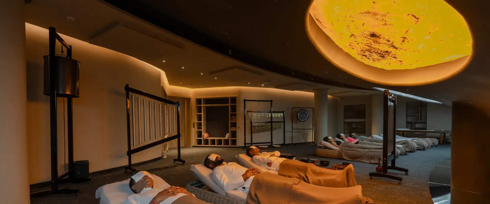 Sound Healing for Anxiety & Stress — Swastik Wellbeing Guest lying in deep relaxation during a sound healing session