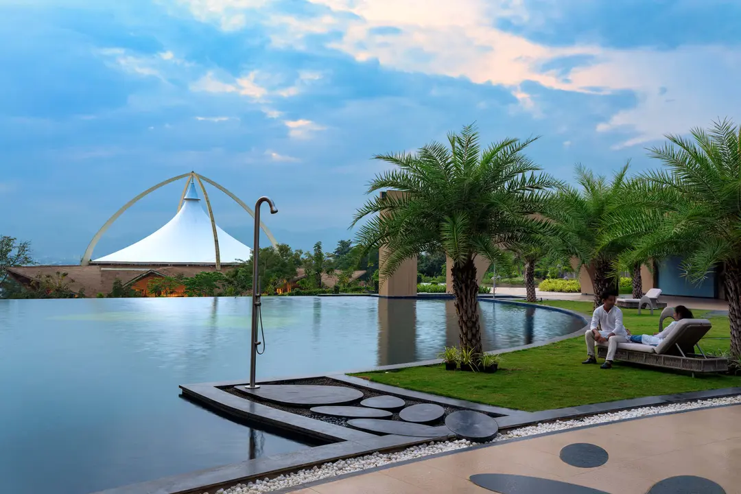 anand-kund Anand Kund swimming pool at Swastik Anand Vihar, offering serene water workouts with stunning views of the Peacock Valley.