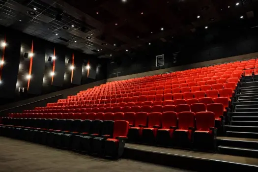 sangithi Interior of Sangithi Auditorium at Swastik Anand Vihar, offering lectures to enhance spiritual growth in a luxury wellness retreat.