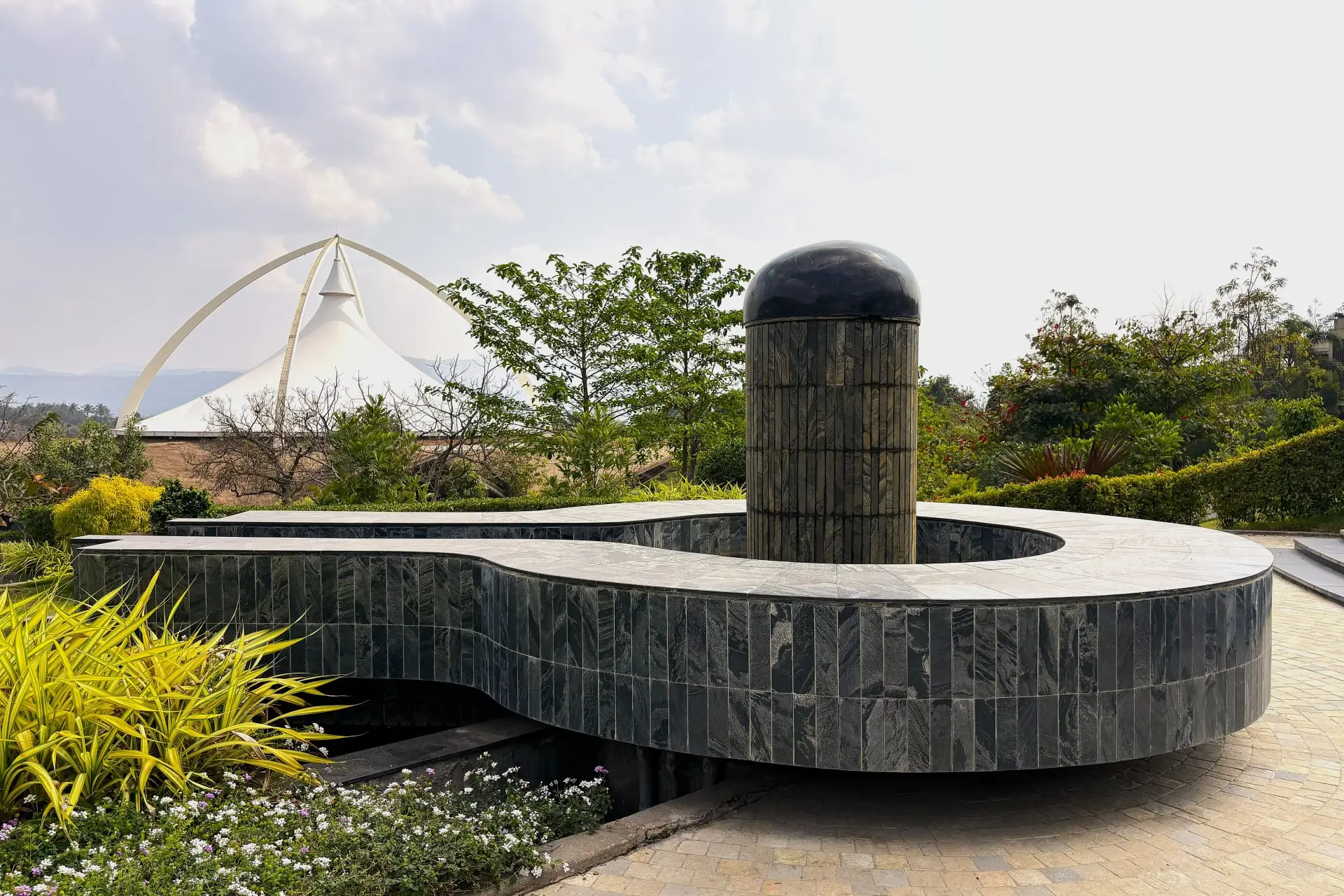 shiv kund Shiv Kund fountain, a notable landmark at Swastik Utsav Vihar Pune, enhances ambiance in the wellness retreat.