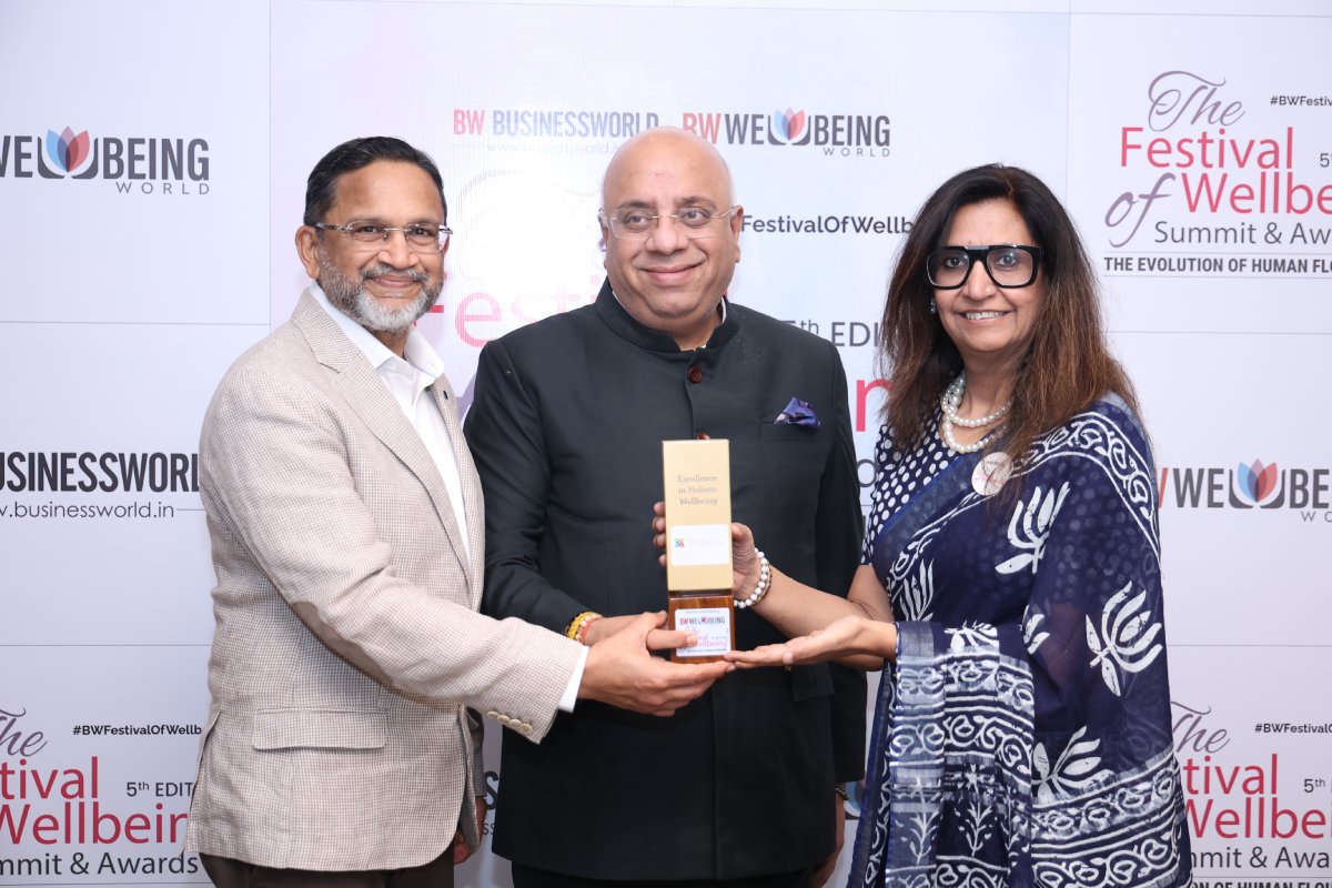 Swastik Wellbeing receiving Excellence in Holistic Wellbeing Award